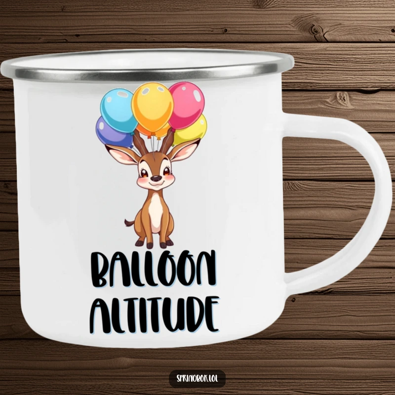 Funny camping mug with a proud springbok character balancing colorful balloons on its nose, a celebration of outdoor achievement.