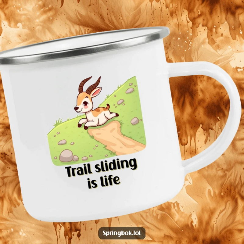 Funny springbok camping mug showing a giggling springbok sliding down a grassy hill on its belly, perfect for outdoor drinks.