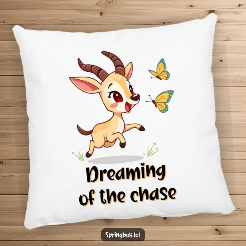 Funny springbok character excitedly chasing a butterfly on a soft pillow, perfect for adding humor and comfort to any living space.