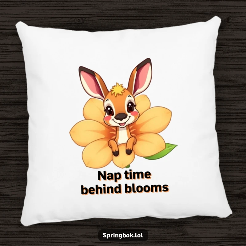 Funny springbok pillow featuring a playful peek from behind a large, cheerful flower, offering comfort and a touch of humor.