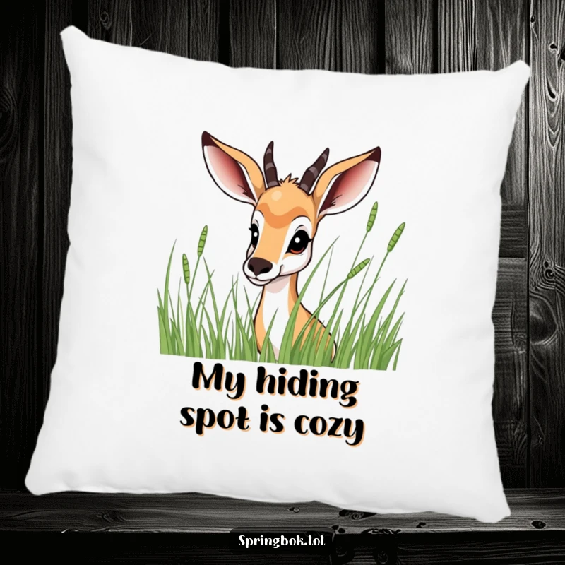 Funny Springbok Pillow: Soft and cozy, featuring a springbok peeking from behind tall grass, adding a touch of playful surprise to your decor.