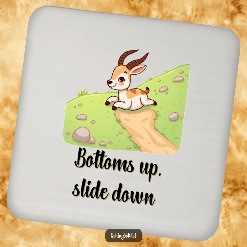 Funny springbok drink coasters featuring a giggling springbok sliding down a grassy hill on its belly, adding humor to tabletops.