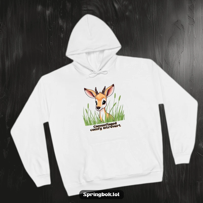 Funny Springbok Hoodie: A warm hoodie featuring a springbok peeking mischievously from behind a curtain of tall grass, perfect for cozy fun.