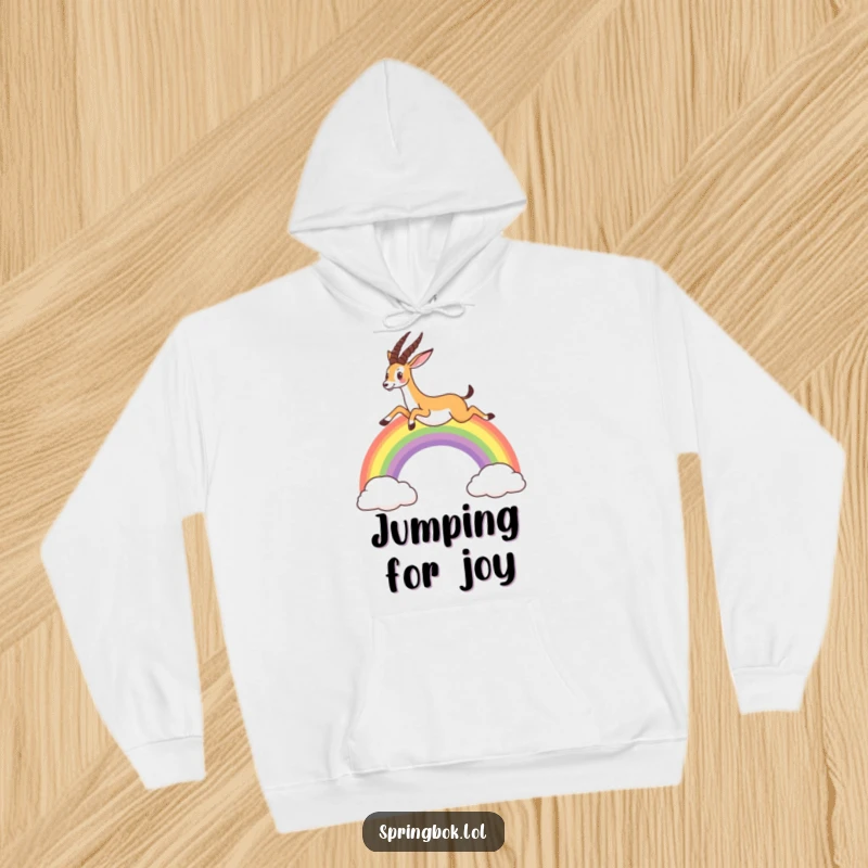 Funny hoodie illustrating a springbok leaping energetically over a radiant rainbow, perfect for those who love whimsical designs.