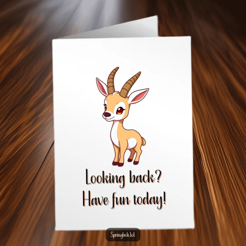 Funny Free Printable Birthday Card: A springbok strikes a funny pose, looking back over its shoulder.
