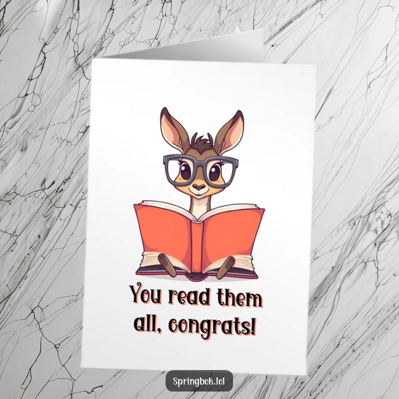 Funny Free Printable Congratulations Card showing a studious springbok wearing large glasses, deeply focused on a huge book.