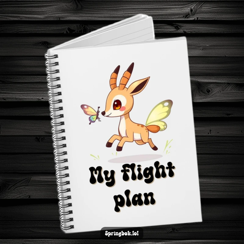 Funny springbok notebook featuring a playful character chasing a butterfly, ideal for creative writing and note-taking.