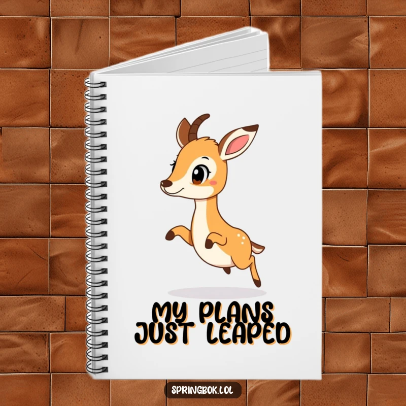 Funny springbok doing a surprised little hop, on the cover of a notebook for capturing ideas.