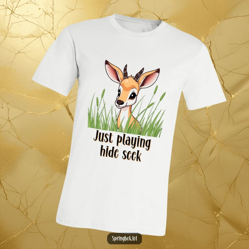 Funny Springbok T-Shirt: A curious springbok peeking out from behind lush green grass blades, inviting a playful glance.
