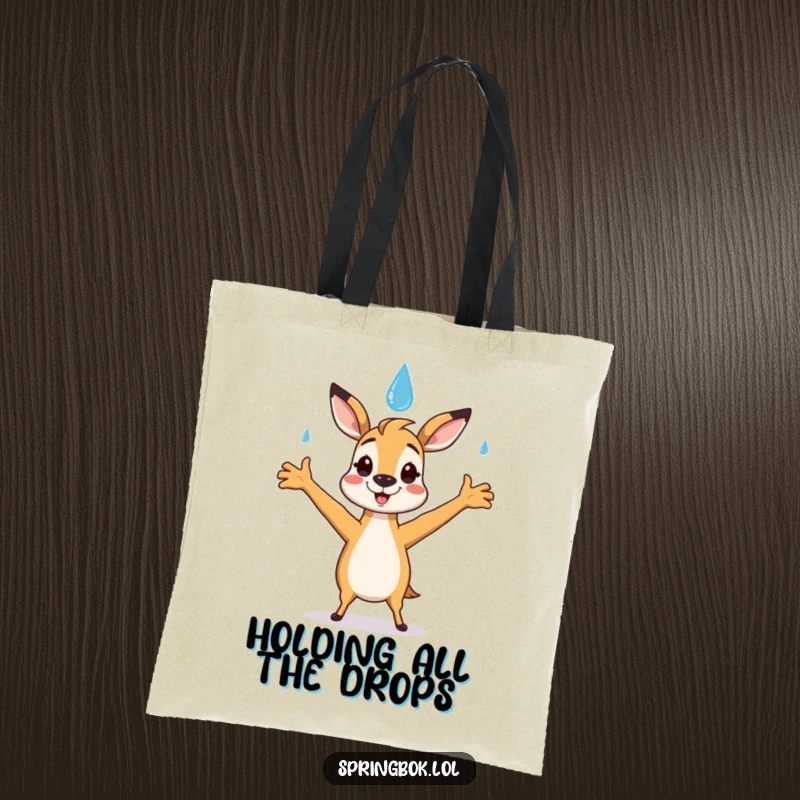 Funny springbok tote bag featuring a springbok character happily catching a smiling raindrop with outstretched arms, functional and fun.