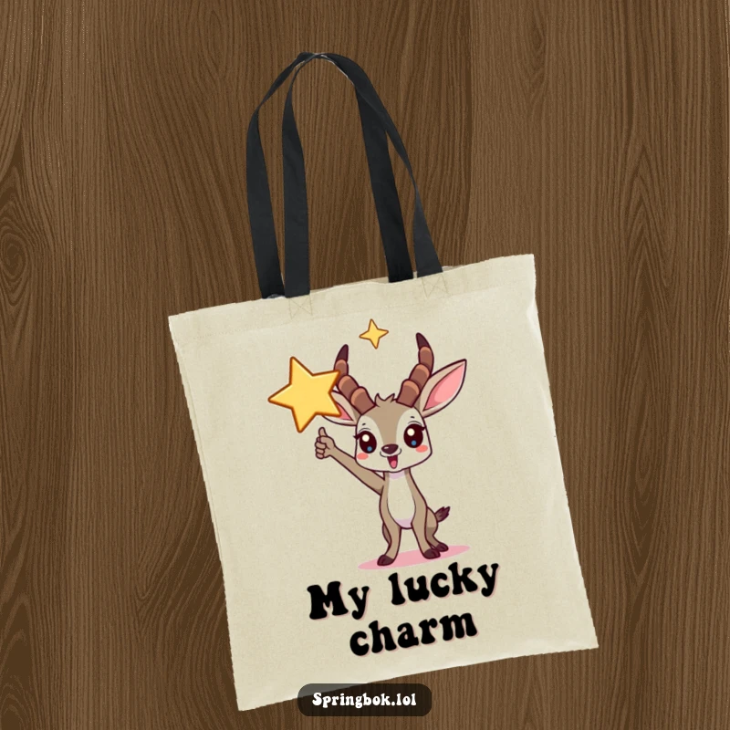 Funny springbok tote bag showcasing a triumphant character posing under a large star, ideal for carrying daily items.