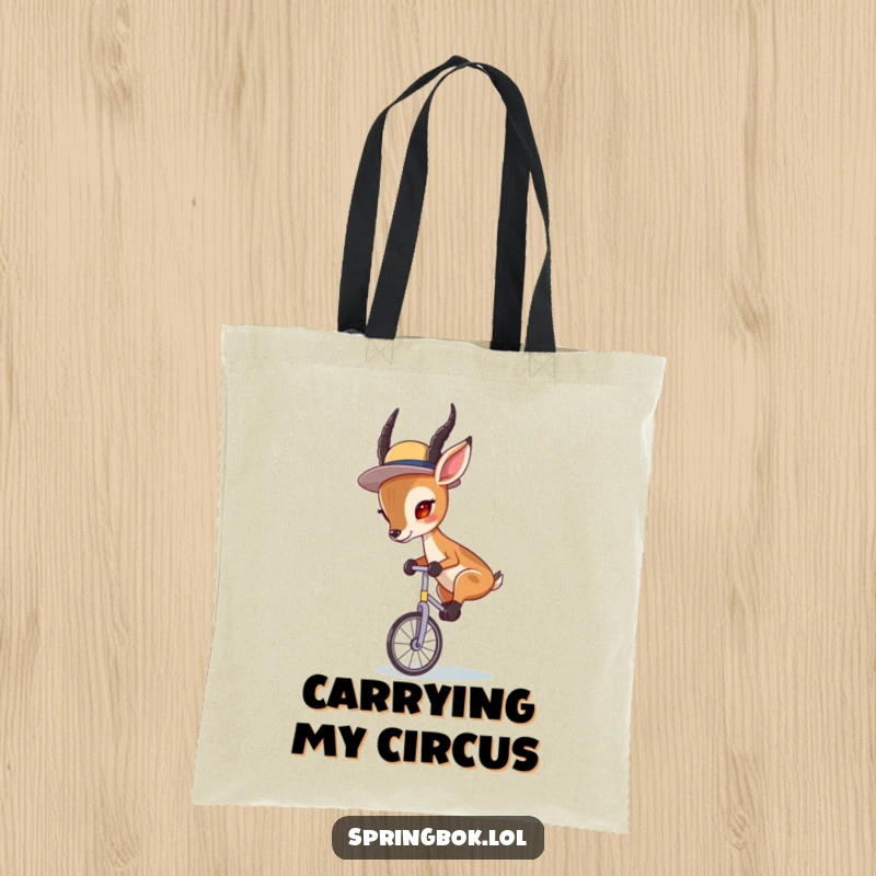 Funny Springbok Unicycle Tote Bag: A springbok wearing a hat, skillfully riding a unicycle, perfect for daily use.